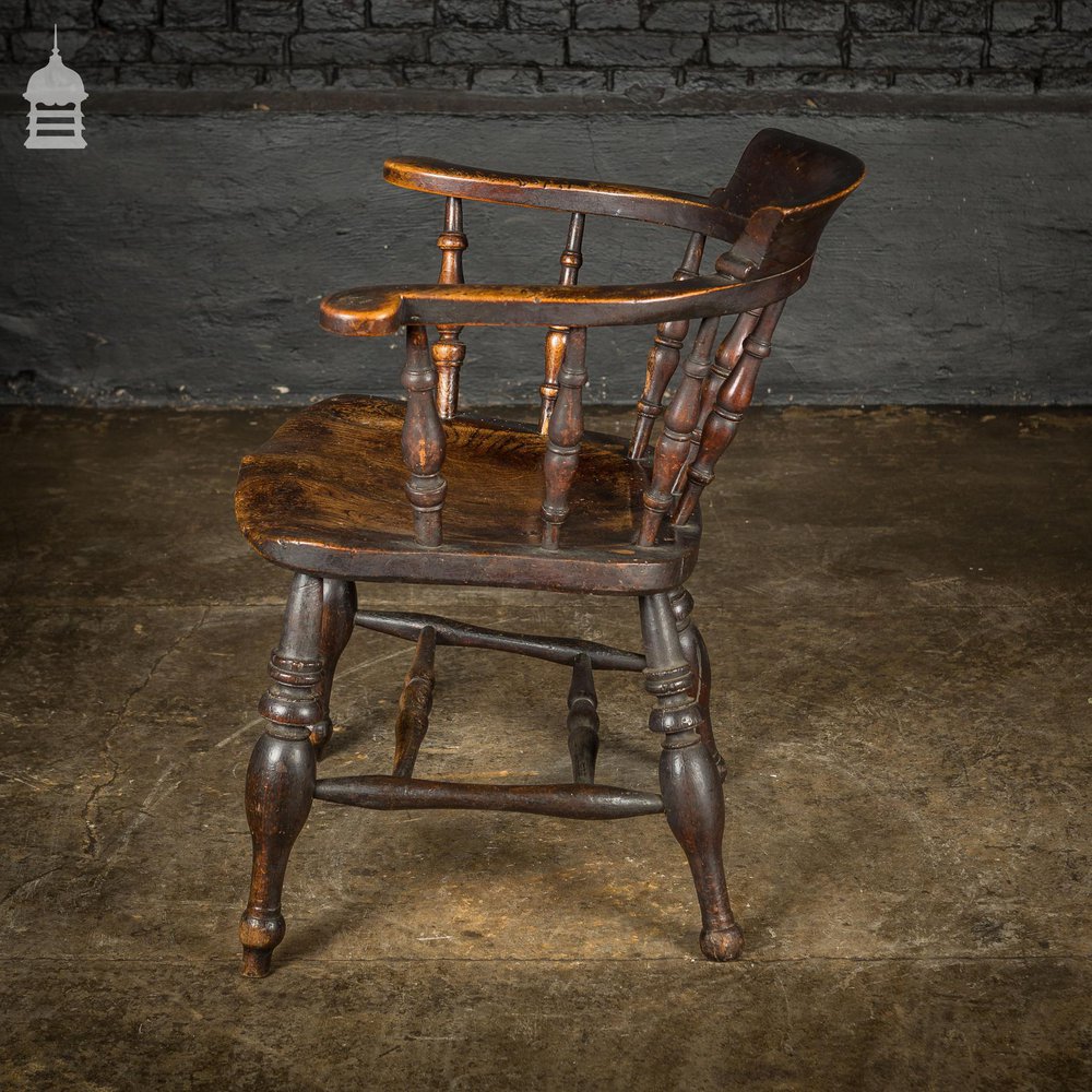 19th C Captains Bow Seat Smokers Chair with Turned Arm Supports and Double H Stretcher