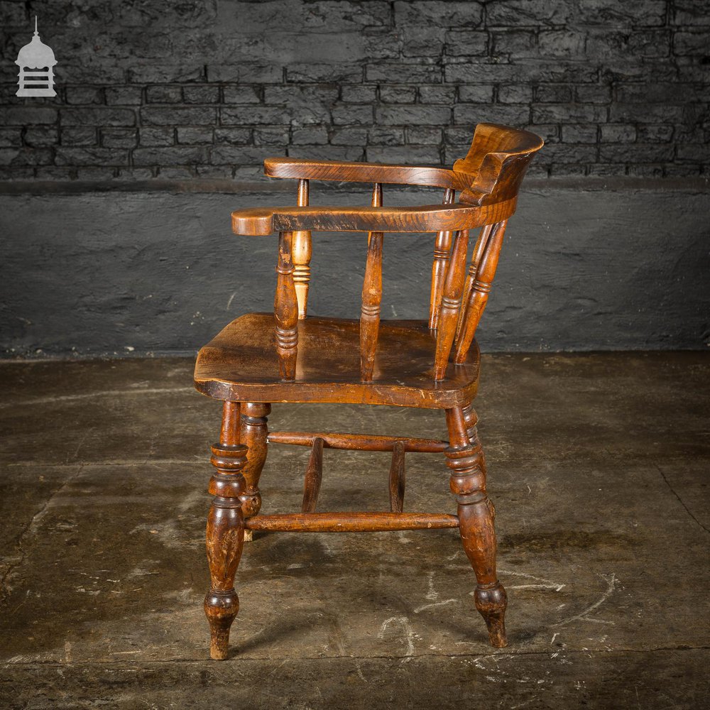 19th C Captain's Bow Seat Smokers Chair with Turned Arm Supports and Double H Stretcher