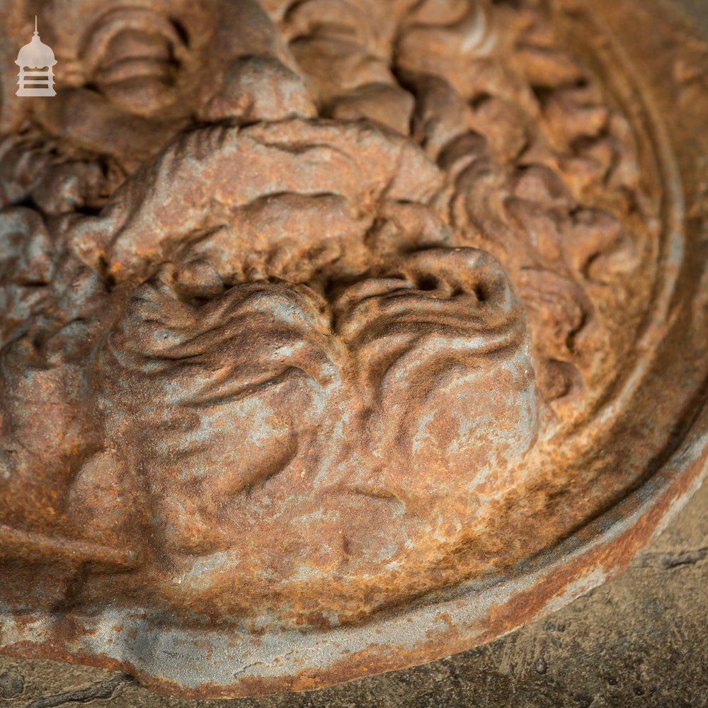 Pair of Round Cast Iron Greek God Mythical Figure Relief