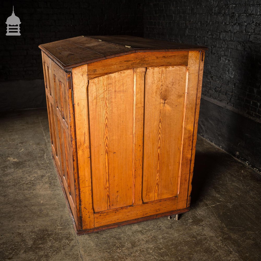 Large 19th C Figured Pitch Pine Ecclesiastical Cupboard with Double Doors, Opening Top and Metal Castors