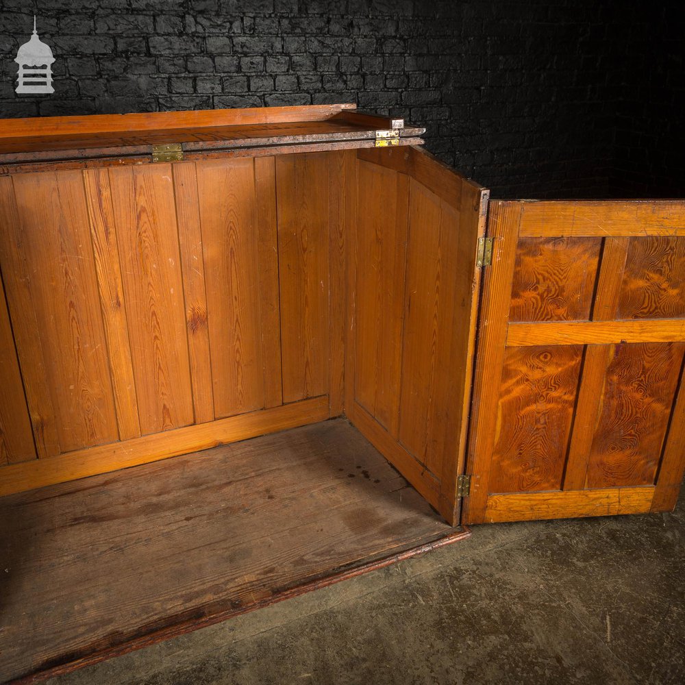 Large 19th C Figured Pitch Pine Ecclesiastical Cupboard with Double Doors, Opening Top and Metal Castors