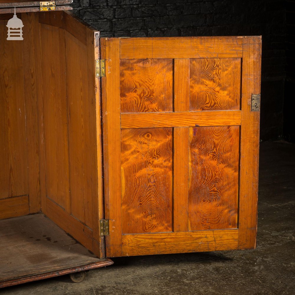 Large 19th C Figured Pitch Pine Ecclesiastical Cupboard with Double Doors, Opening Top and Metal Castors