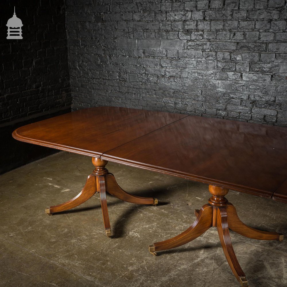 Exceptional Georgian Style Mahogany Four Pillar Table with Brass Castors