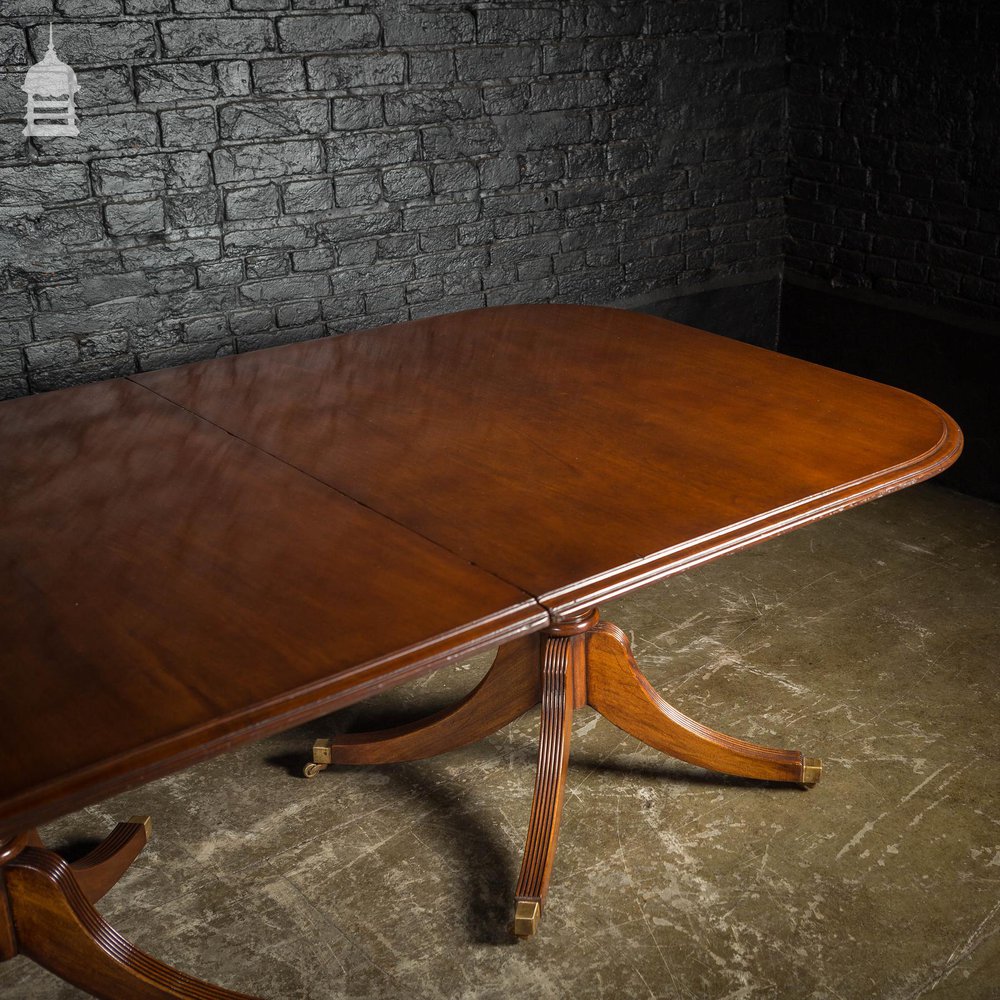 Exceptional Georgian Style Mahogany Four Pillar Table with Brass Castors