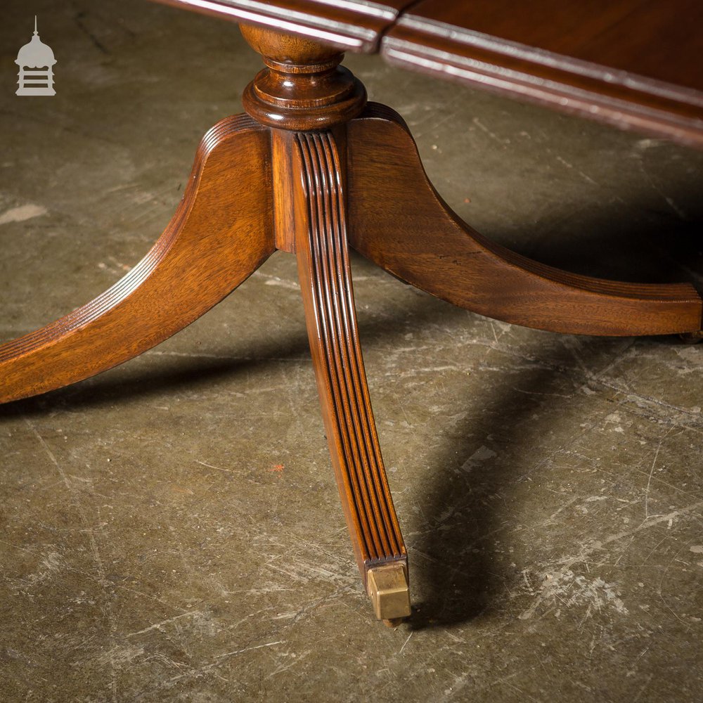 Exceptional Georgian Style Mahogany Four Pillar Table with Brass Castors