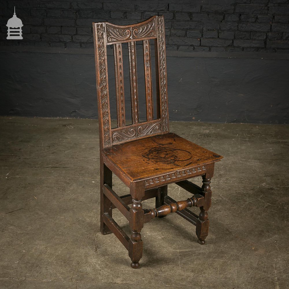 18th C Oak Chair with Ornate Hand Carved Detail and Single Plank Seat