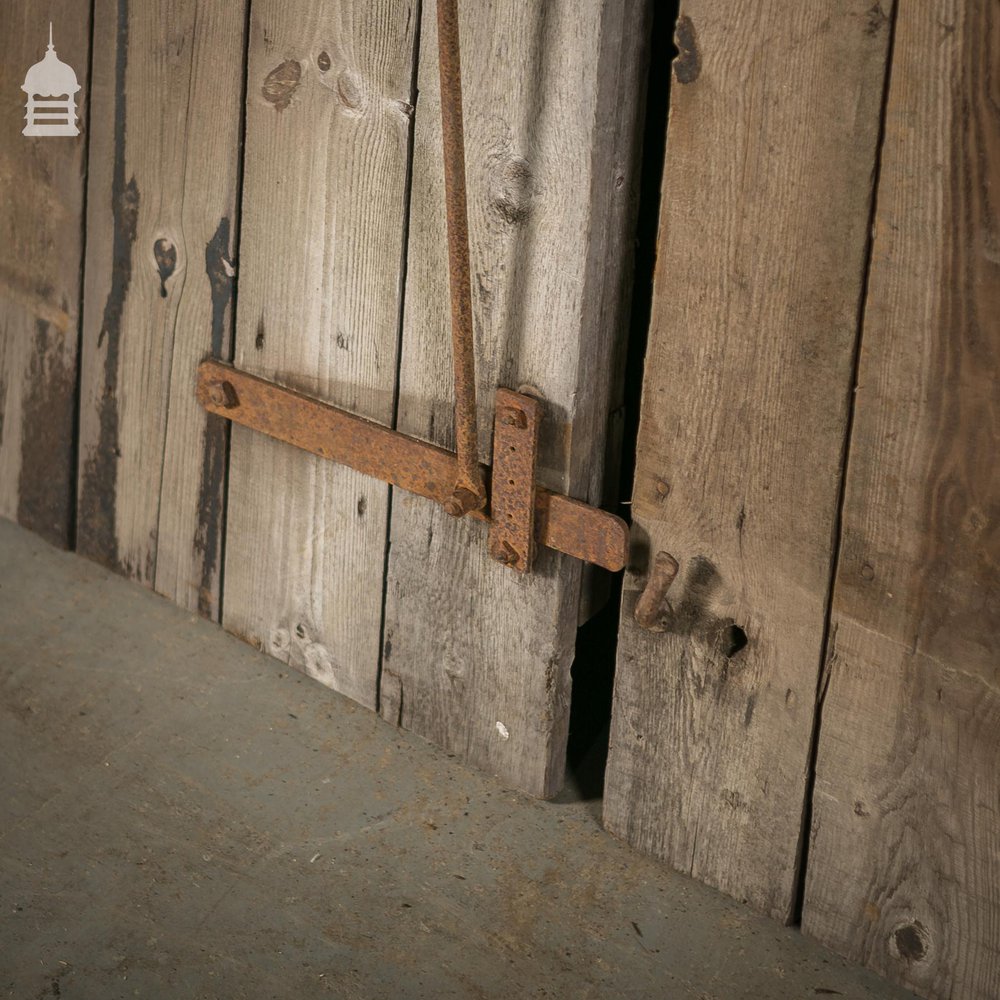 Pair of Reclaimed Pine Ledged and Braced Barn Doors with Double Latch Mechanism