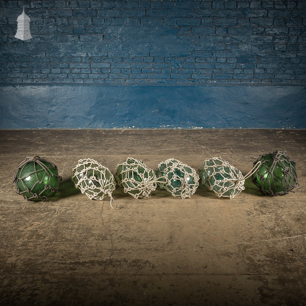 Set of Three Green and White Glass and Rope Fishing Floats