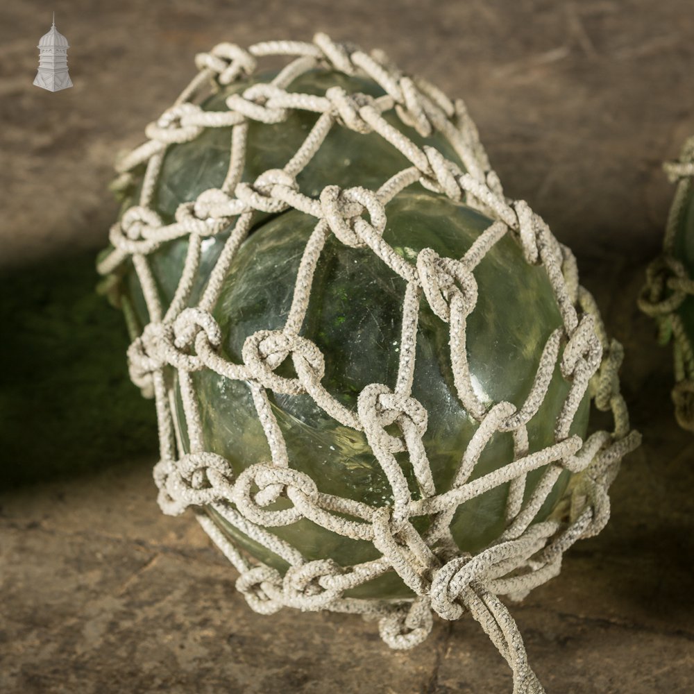 Set of Three Green and White Glass and Rope Fishing Floats