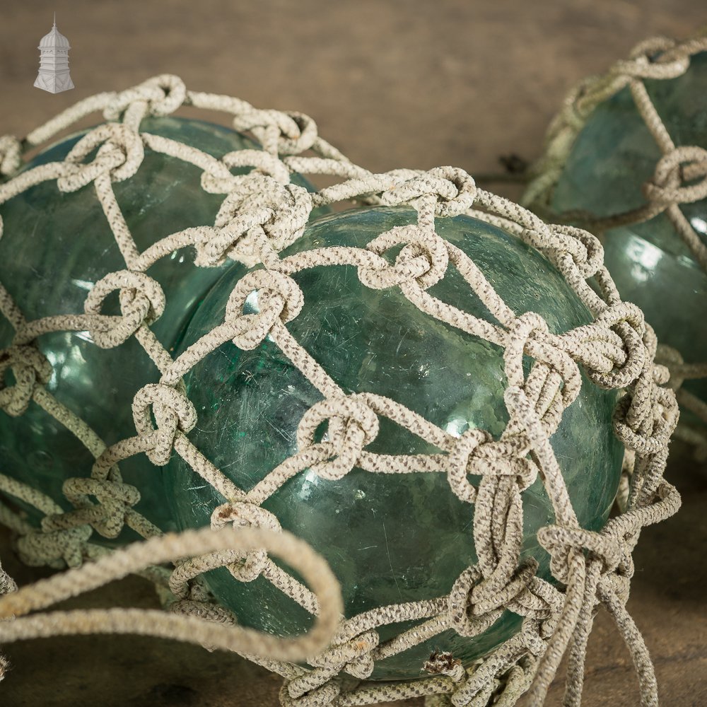 Set of Three Green and White Glass and Rope Fishing Floats