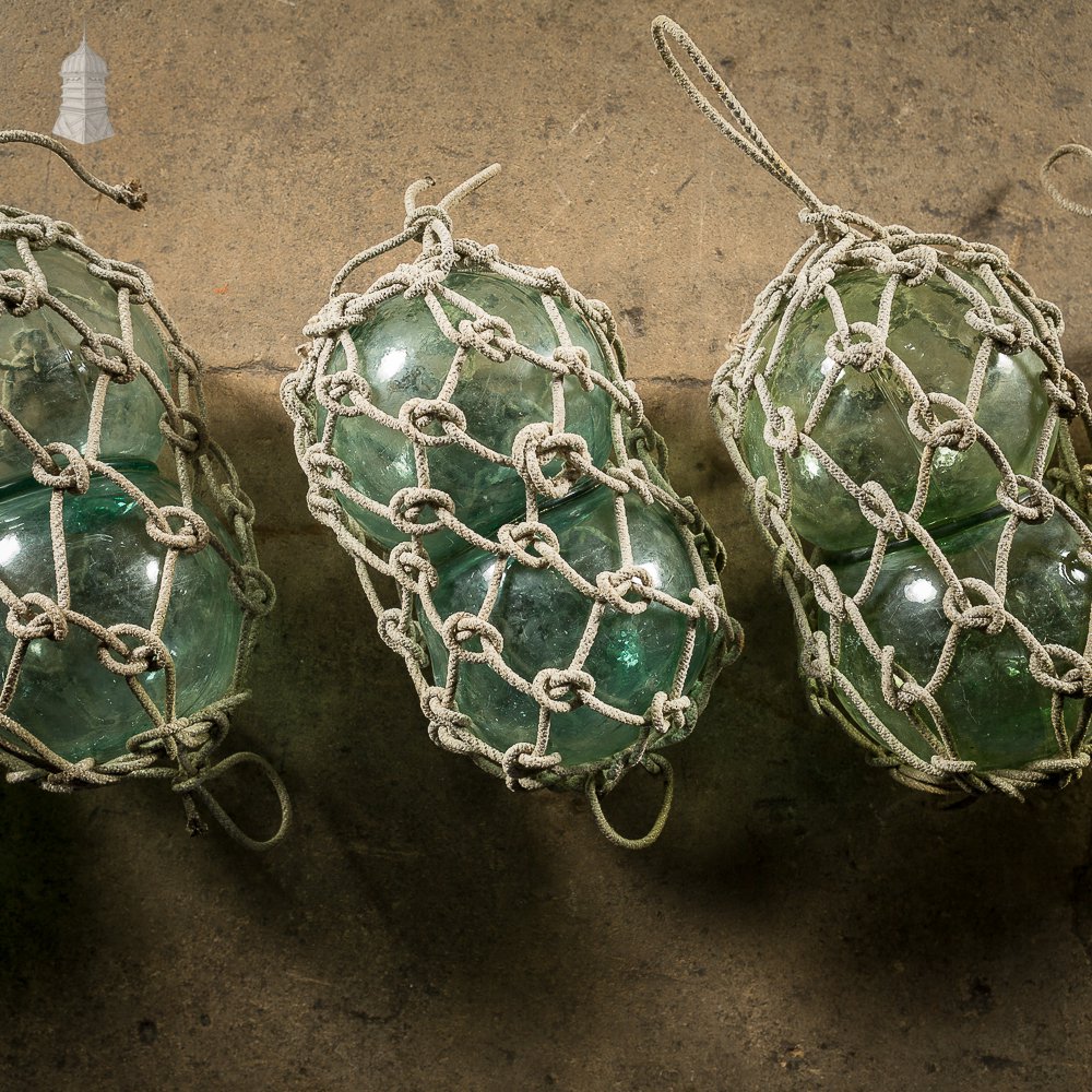 Set of Three Green and White Glass and Rope Fishing Floats