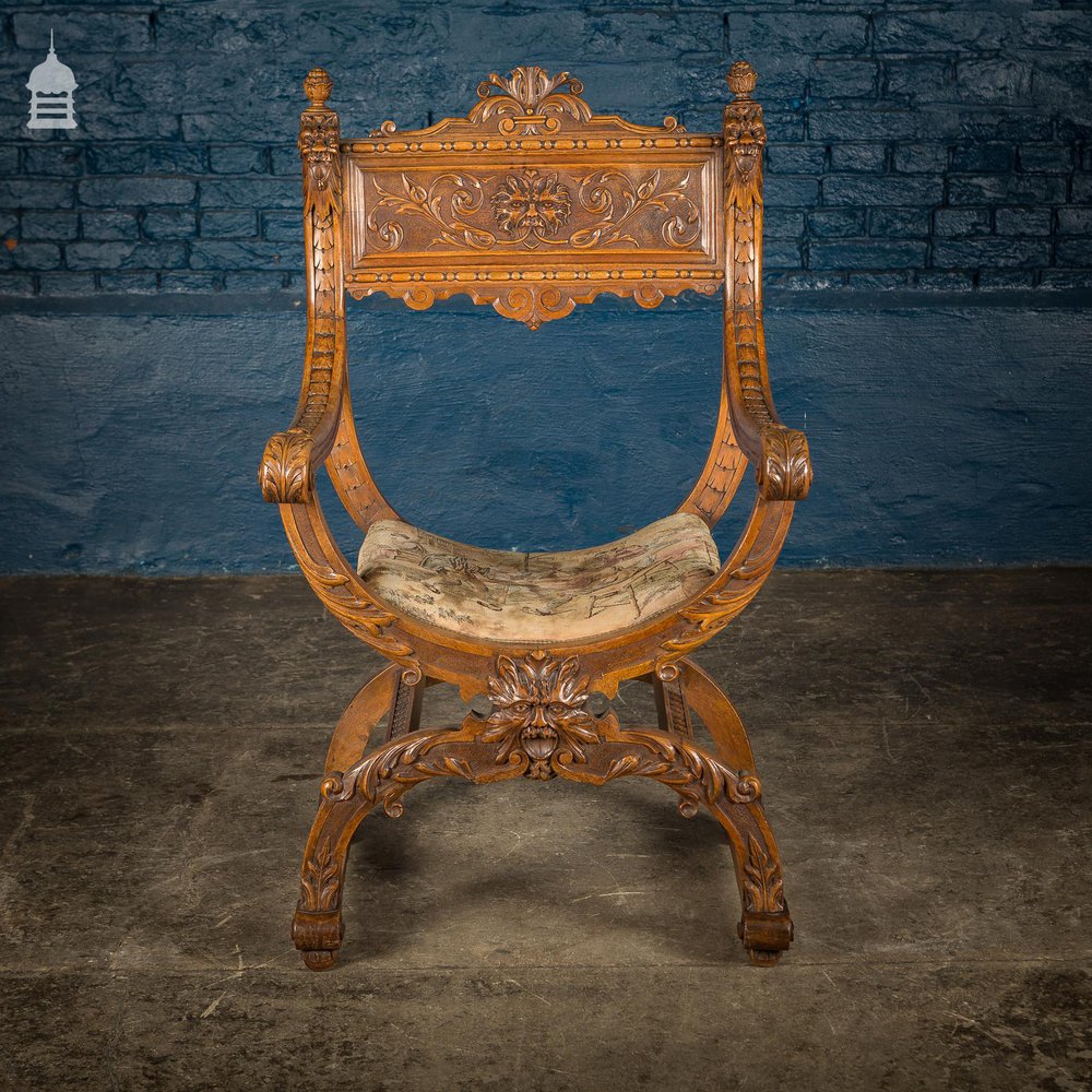 NR25421: 19th C Ornate Carved European Renaissance Walnut Grain X Frame Chair