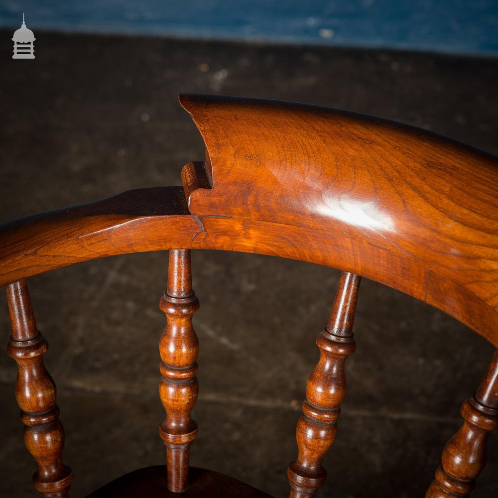 19th C Elm Captain’s Bow Seat Smokers Chair with Turned Arm Supports and Double H Stretcher