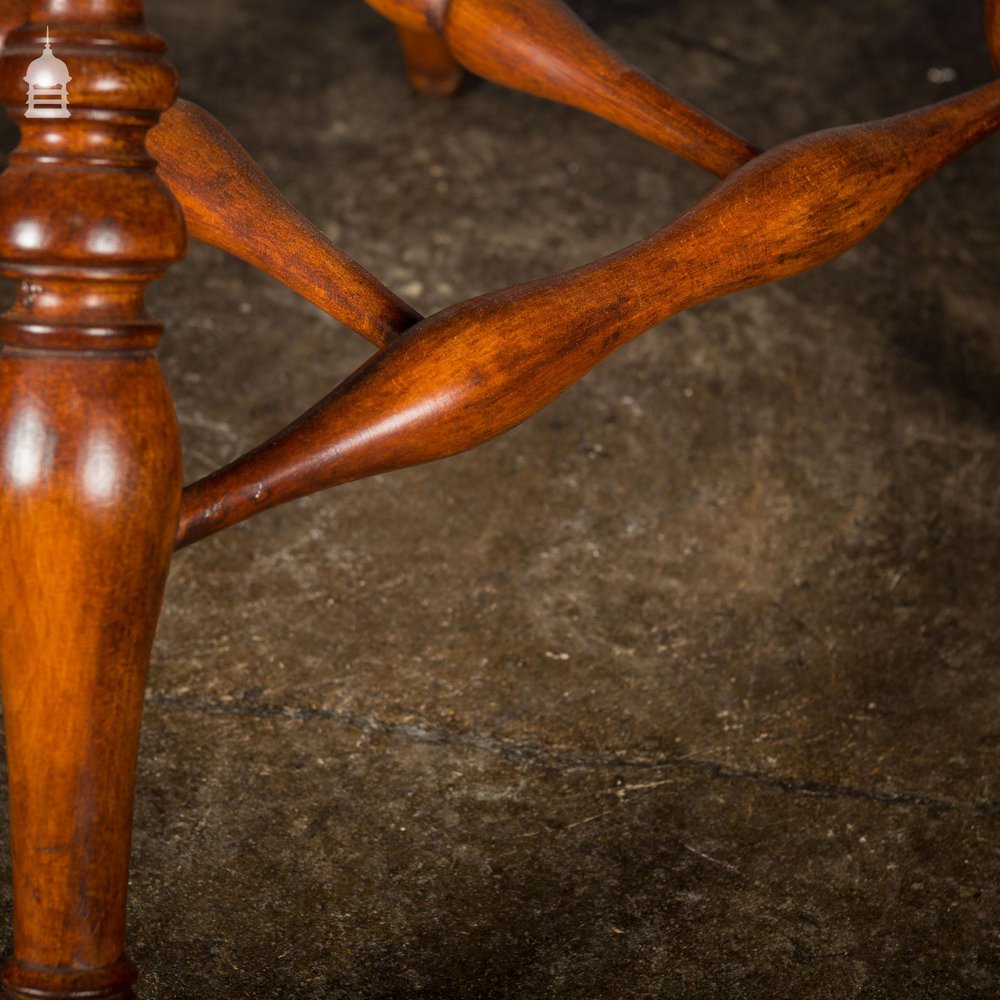 19th C Elm Captain’s Bow Seat Smokers Chair with Turned Arm Supports and Double H Stretcher