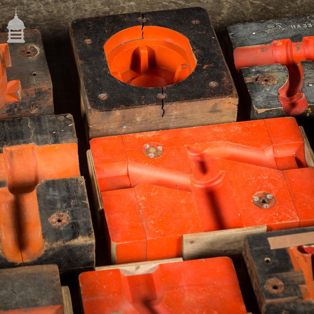 Collection of 60 Black and Red Industrial Factory Foundry Moulds