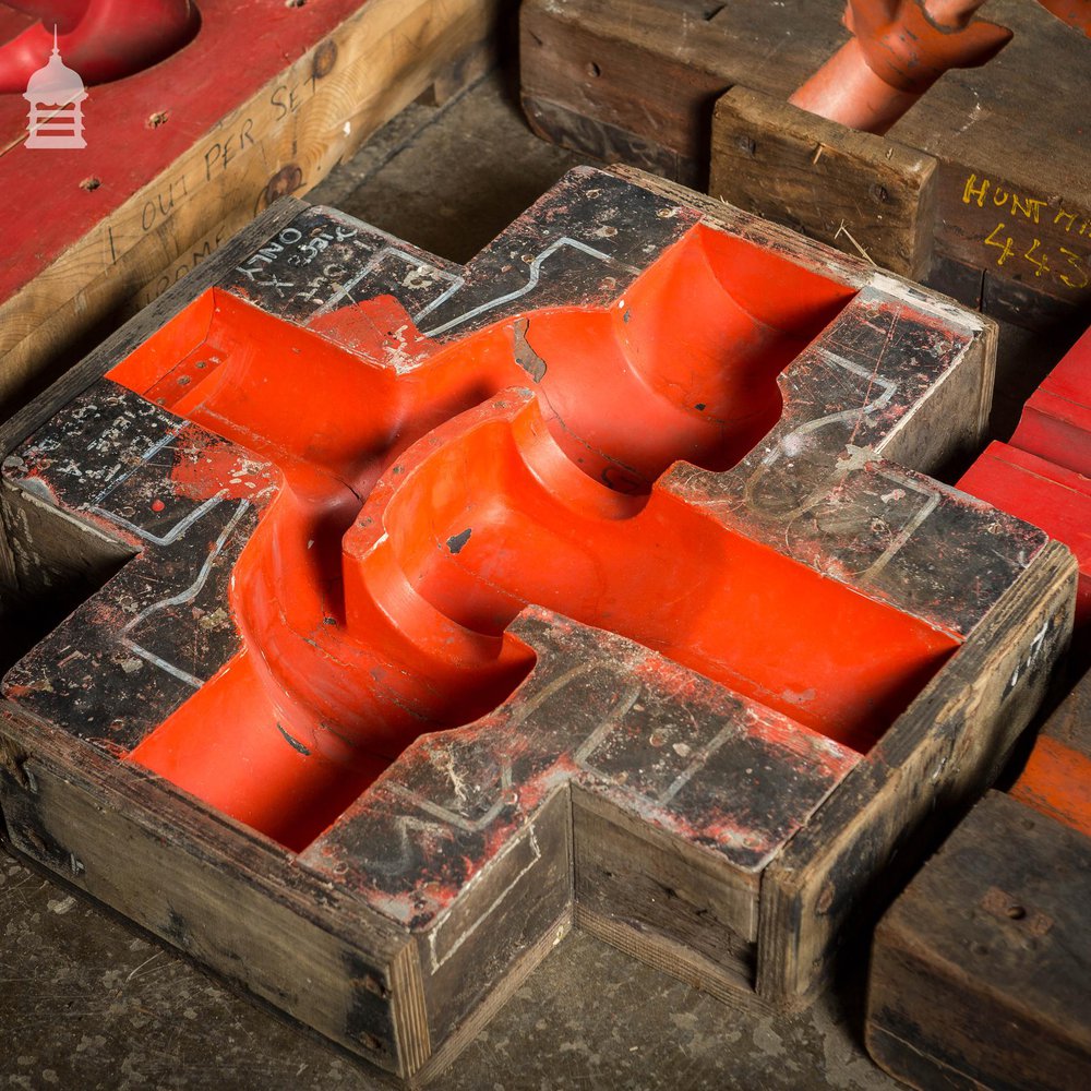 Collection of 18 Red and Black Industrial Factory Moulds