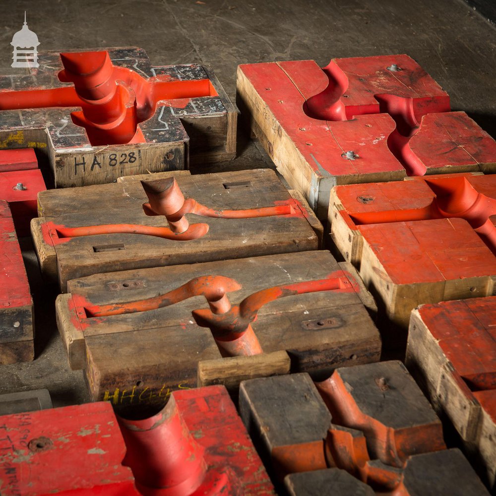 Collection of 18 Red and Black Industrial Factory Moulds