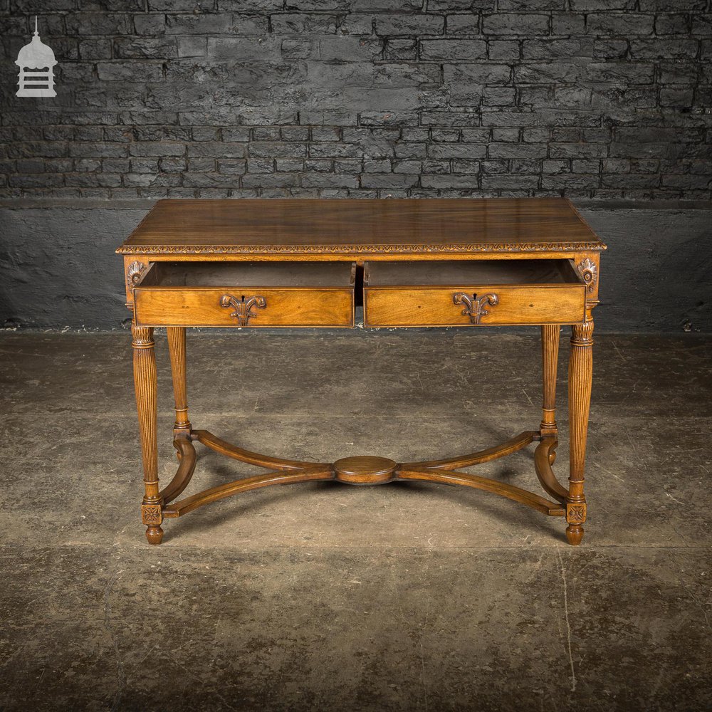 A Fine Late 19th C Sheraton Style Writing Table with Carved Prince of Wales Feathers Escutcheons and Elegant Mellon Fluted Legs.