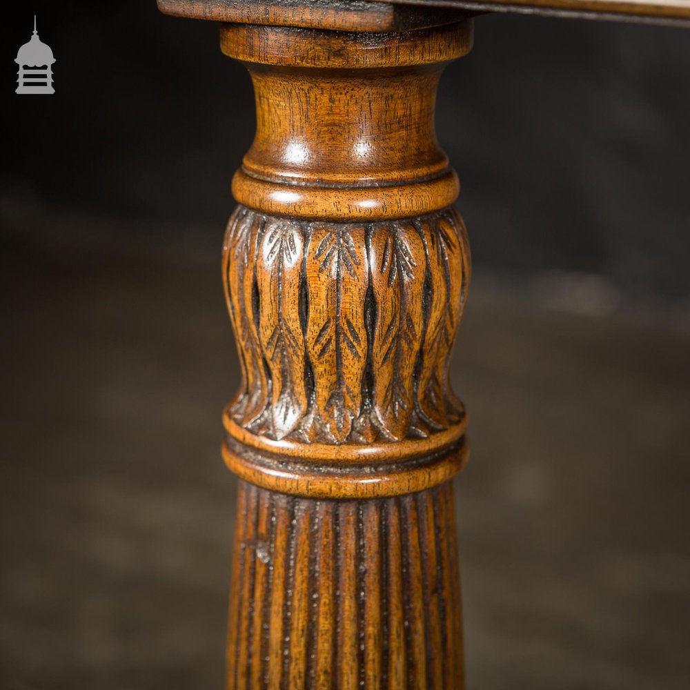 A Fine Late 19th C Sheraton Style Writing Table with Carved Prince of Wales Feathers Escutcheons and Elegant Mellon Fluted Legs.