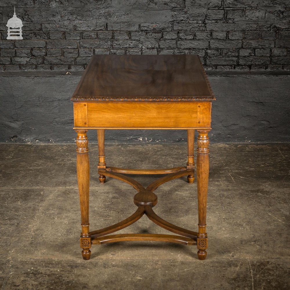 A Fine Late 19th C Sheraton Style Writing Table with Carved Prince of Wales Feathers Escutcheons and Elegant Mellon Fluted Legs.