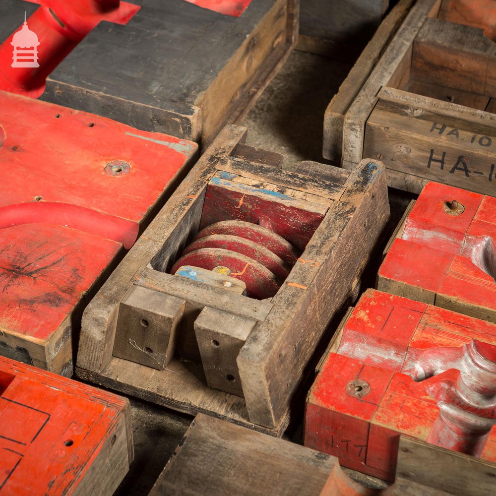 Collection of 28 Red and Black Industrial Foundry Factory Moulds