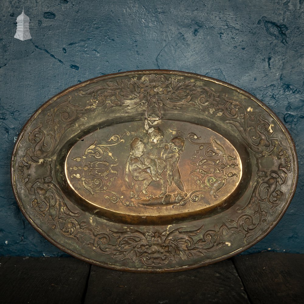 Brass Charger Plate, 18th C French, Oval with Embossed Detail Depicting Cherubs