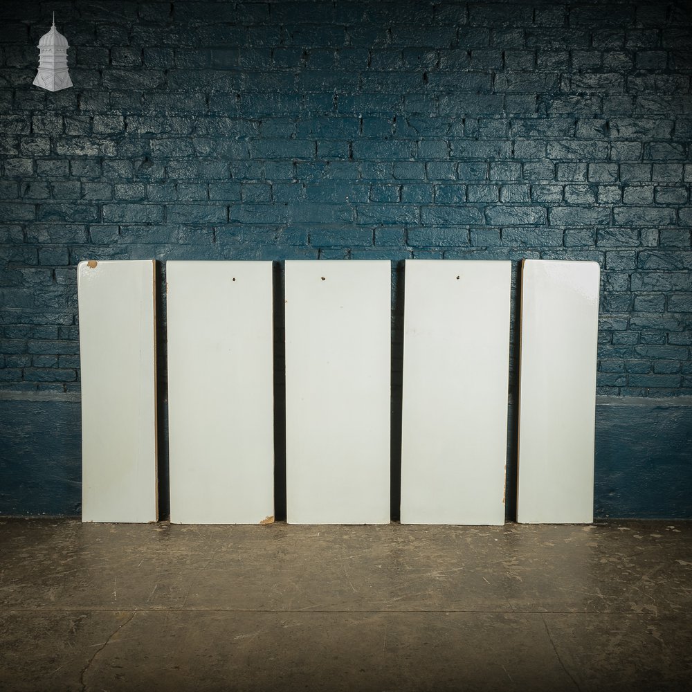 Reclaimed slab urinal backsplash and end panels, white glazed