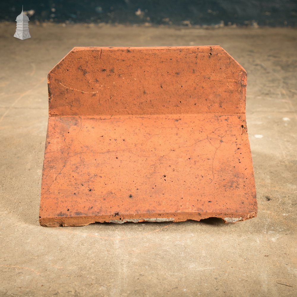 Capped Ridge Tiles, A Batch of 55 Reclaimed Terracotta