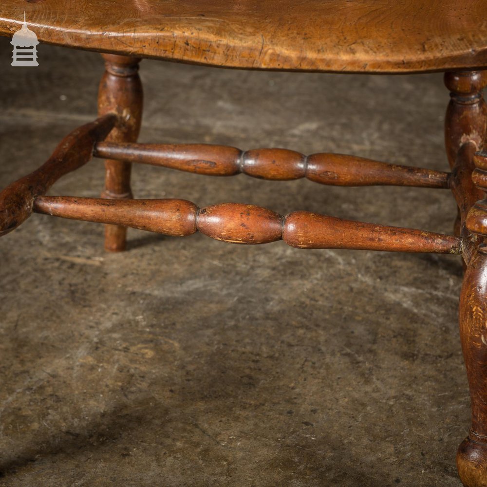 19th C Elm Captains Bow Seat Smokers Chair with Turned Arm Support and Double H Stretcher