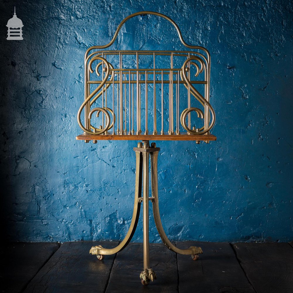 19th C Brass and Oak Swivel Sheet Music Or Record Rack With Claw Feet, Ceramic Castor’s and Treble Clef Design