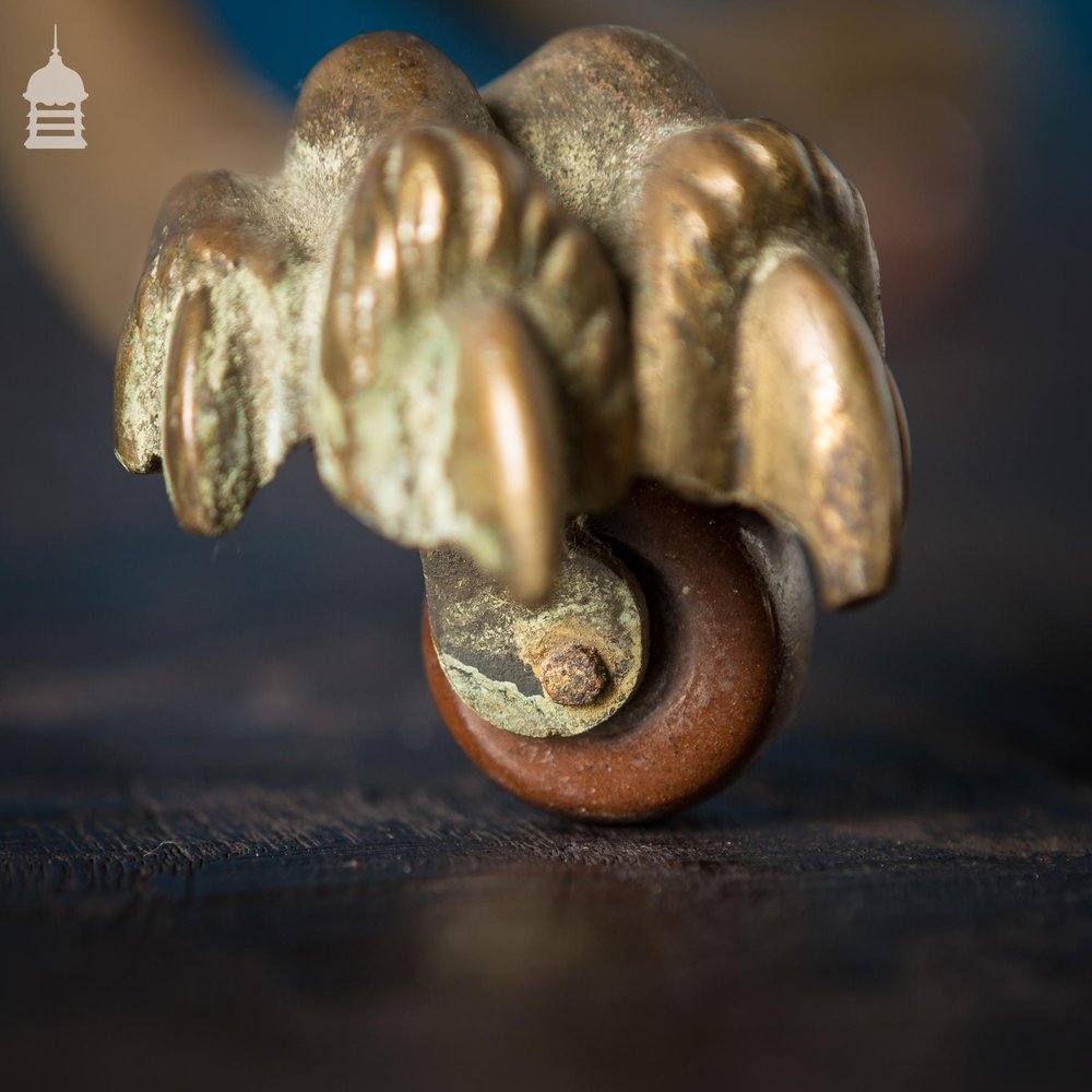 19th C Brass and Oak Swivel Sheet Music Or Record Rack With Claw Feet, Ceramic Castor’s and Treble Clef Design