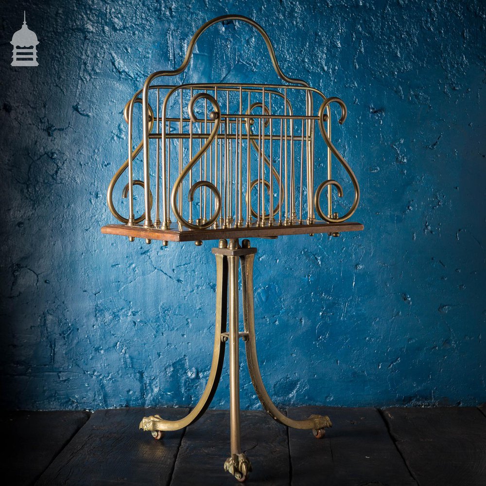 19th C Brass and Oak Swivel Sheet Music Or Record Rack With Claw Feet, Ceramic Castor’s and Treble Clef Design